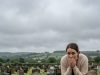 I was mourning my twin daughters at their grave, blinded by tears, when a little boy tugged on my coat and said, ‘Mom… those girls are in my class.’ In that single, heart-stopping moment, my grief turned into a terrifying mystery.